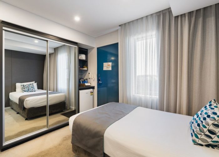 Standard-Room-with-King-and-Single-Bed-City-View-5